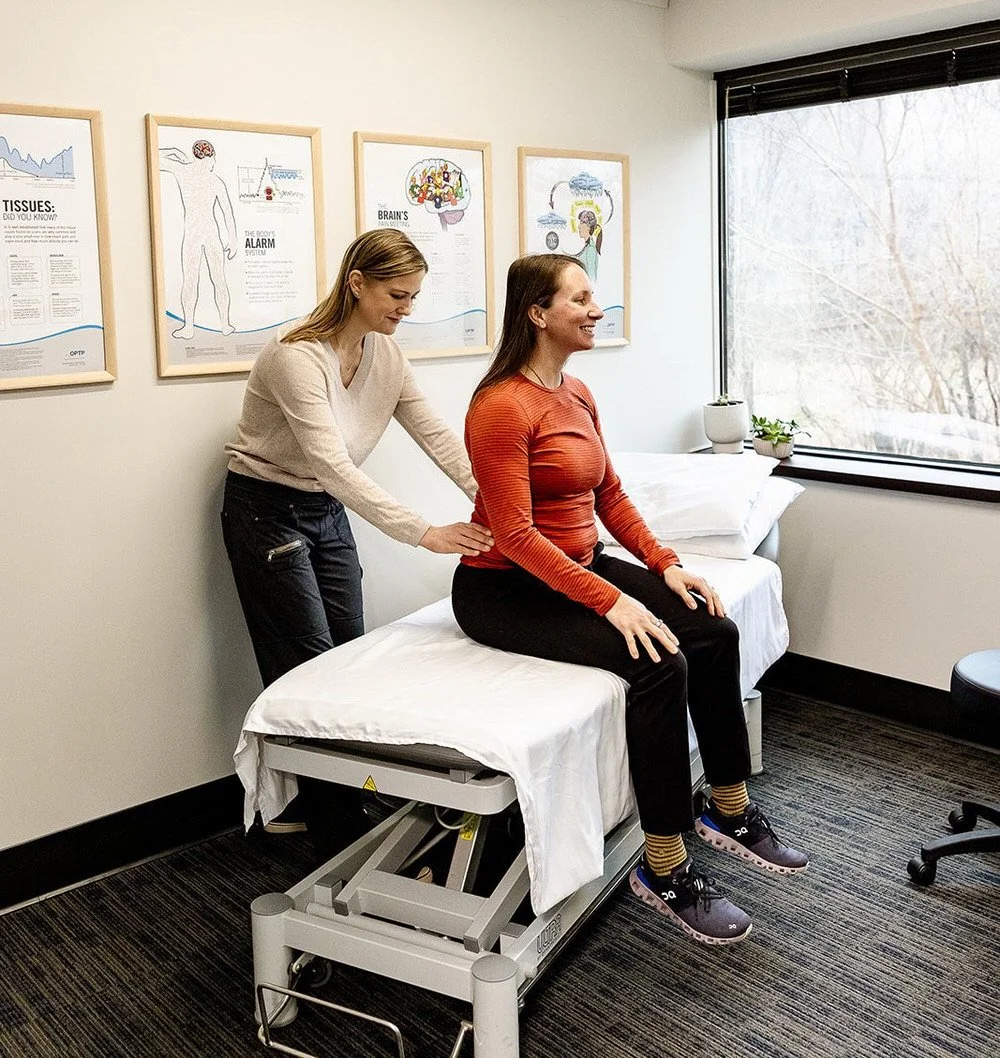 Bethany Hansen evaluating a physical therapy patient in Edina, Minnesota